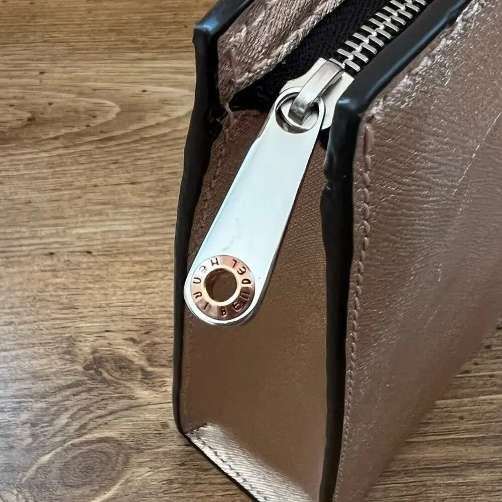 Henri Bendel West 57th Cosmetic Clutch in Rose Gold